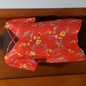 Red floral criss-cross short sleeved shirt